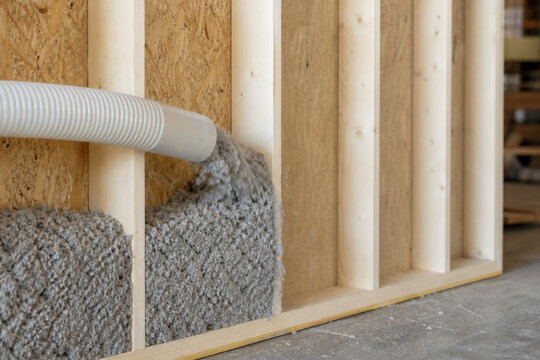 Cellulose Insulation in Timber Wall Cavity Made from Recycled Paper Fiber