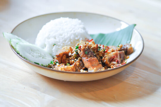 stir fried pork or deep fried pork , fried pork or crispy pork and rice or  belly of pork