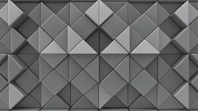 Abstract geometric background featuring a dark gray surface covered in repeating three-dimensional pyramid shapes with.