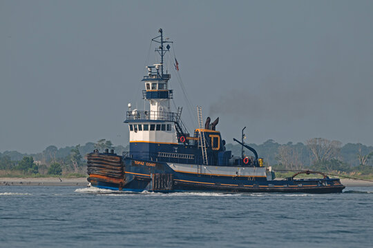 Dan Marine Towing Company's tugboat Topaz Coast at work in Charleston Harbor, SC, USA, on August 25, 2026.