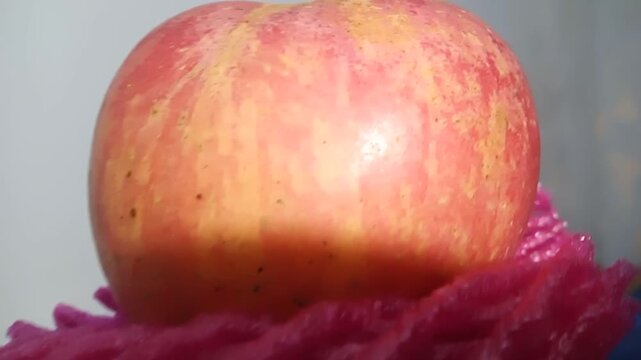 Fresh pink lady apple isolated of white bacground