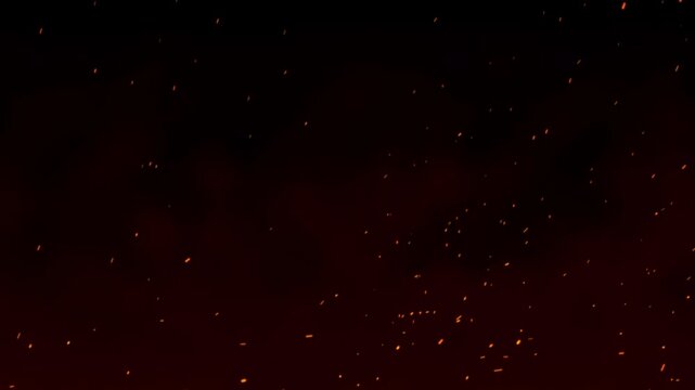 Bright glowing fire particles rising in fiery sky, Flying sparks. Fire sparks rising up. 4K Video