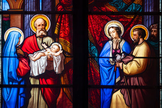 Stained glass depicting the presentation of Jesus at the temple.