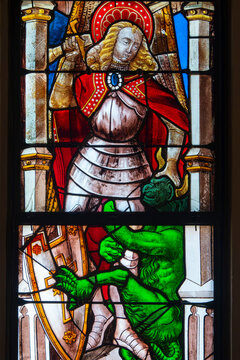 Saint Michel the Archangel killing a demon.