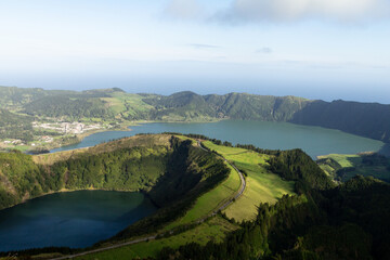 The twin crater lakes of Sete Cidades lie within a dramatic volcanic caldera on São Miguel Island. © Евгения Руденок