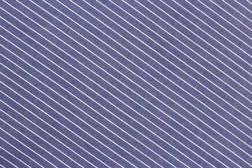 Fototapeta premium Striped fabric close up showing a pattern of blue and white lines