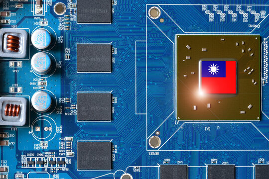 Taiwan flag on a processor of a pc graphics card. Concept representing the global battle for microchip production and technological supremacy.