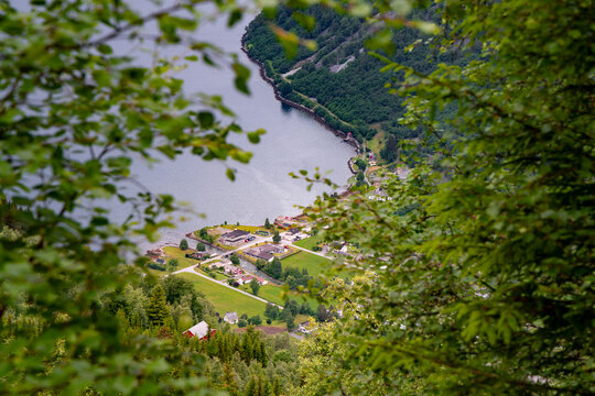 A beautiful summer  landscape with a small village at the fjord from above. A summer scenery of World Heritage Area in Western Norway.