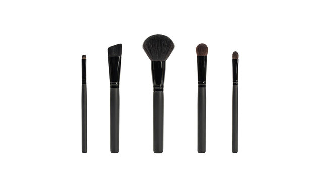 Set of five cosmetic makeup brushes with black handles and soft bristles arranged in a row on white background, isolated on a, transparent background