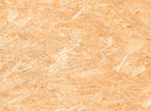 OSB oriented strand board wood texture with flat wood chip pattern, seamless construction panel background for floors, roofs, walls, building and interior design.
