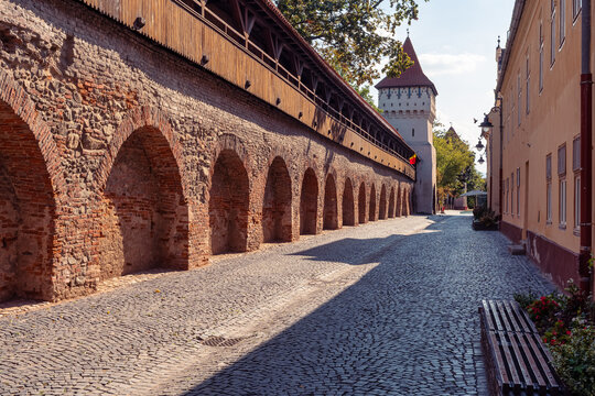 Medieval fortified wall and Potters Tower along Cetatii Street in Sibiu, Transylvania, Romania