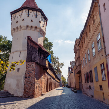 Carpenters Tower and medieval city wall on Cetatii Street in Sibiu, Transylvania, Romania.