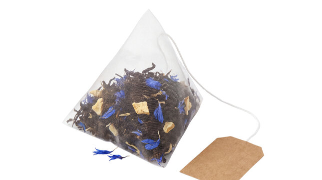 Pyramid tea bag with loose leaf black tea and blue cornflower. Herbal tea sachet with brown paper tag. Gourmet infusion blend. isolated PNG with Transparent Background