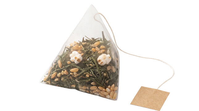 Pyramid tea bag with Genmaicha green tea and roasted rice. Japanese herbal tea sachet with mesh texture. Organic loose leaf tea blend. isolated PNG with Transparent Background