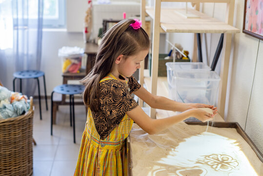 Art therapy for children. Sand animation and sand painting