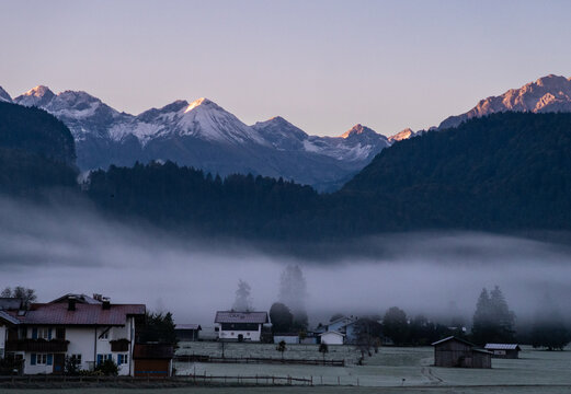 First Light over Frosty Alpine Valley