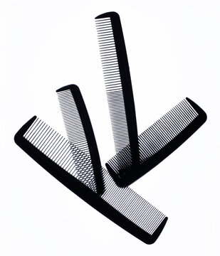 A group of black combs on a white background.