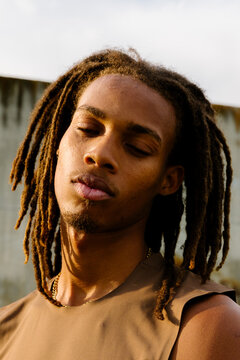 Close-up portrait of a professional athlete in a sunny public park