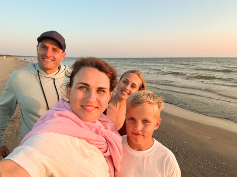 Happy Family Selfie During Vacation On The Sea UGC