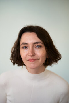 Woman With Short Hair Poses for a Close-Up Picture