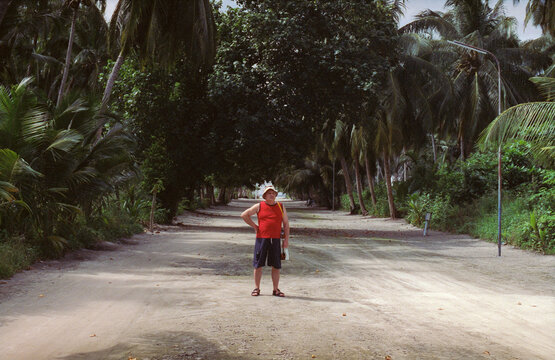 Standing on Palm Road