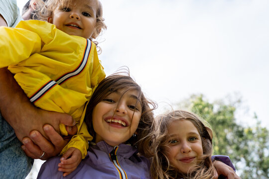 Children Smiling Together Outdoors