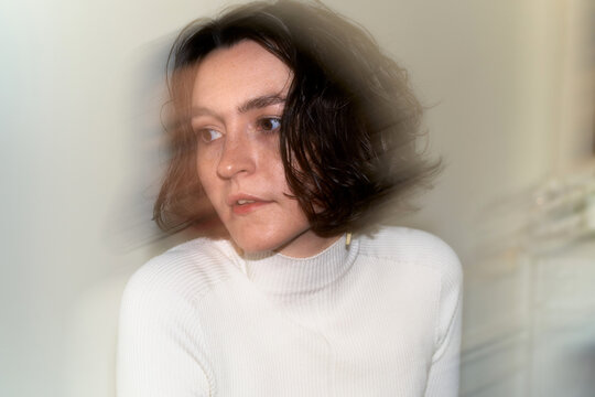 Portrait of a Person With Blurred Background in a Light Space