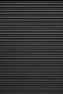 Abstract black and white striped pattern with parallel lines and textures