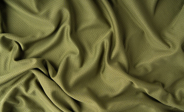 Sport cloth fabric texture background, olive green soccer shirt pattern