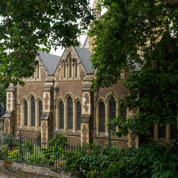 Gothic church facade framed by trees