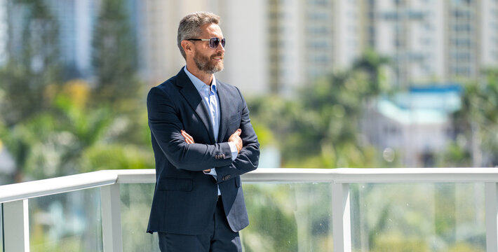 Ambitious businessman in suit, copy space. Business boss man portrait. Successful business and top leadership. Business entrepreneur success. Rich businessman outdoor. Successful businessman leader