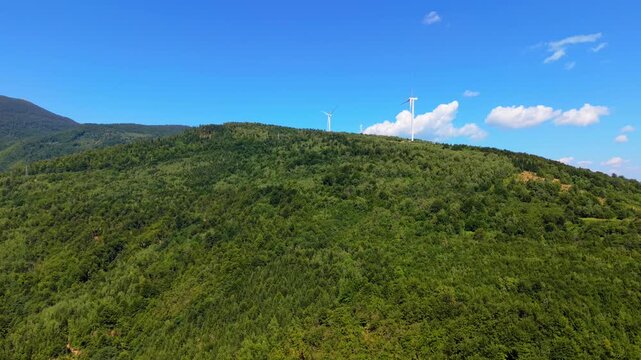 Aerial Wide View of Wind Turbines on Mountain Ridge Near Ivan Sedlo Pass Bosnia