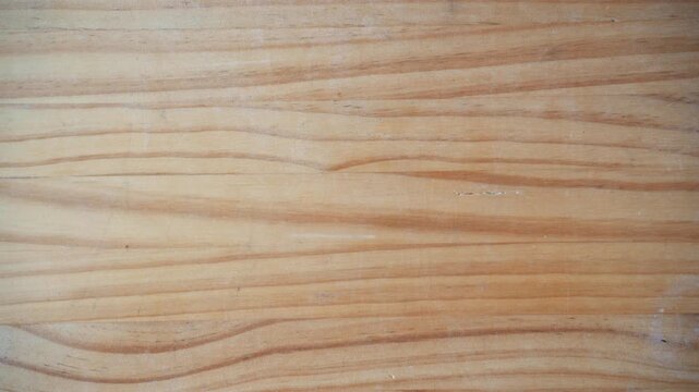 Luck and gambling concept. Dice with number four over wooden table