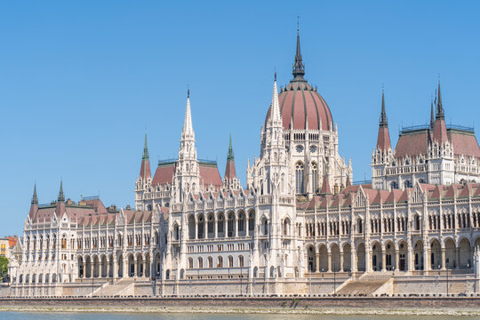 The neo-Gothic building of the Hungarian Parliament on the banks of the Danube in Budapest