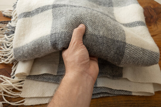 Soft woolen plaid texture with herringbone and plaid pattern in neutral beige and grey tones