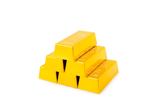 Gold bars isolated on white background. Stack of many shiny gold bars. Fine gold concept. Gold panel background.  Metallic texture. Wealth, luxury, treasure.