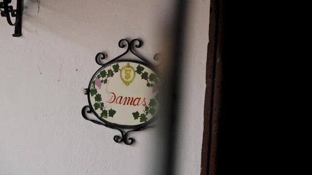Decorative Metal Womens Restroom Sign With Grapevine Motif In Mexico