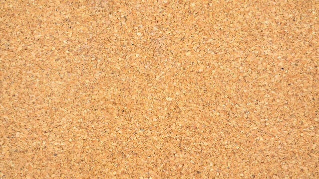 Close up texture of a cork board.