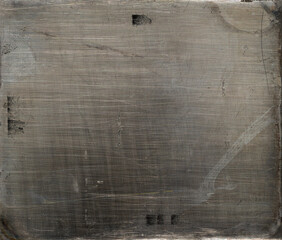 Distressed vintage daguerreotype metal photo plate background, texture with heavy scratches and...