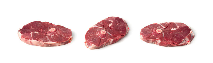 Obraz premium Raw mutton leg fillet isolated, lamb meat pieces, tenderloin or mutton sirloin meat, fresh sheep fillet