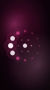 Dots orbiting a centre in sequence, magenta dark vertical 9:16 seamless loop HD motion background