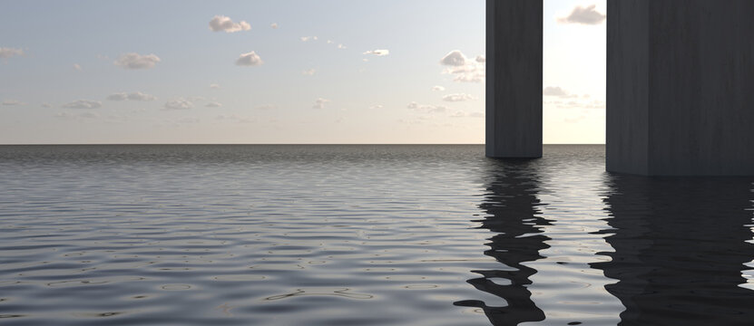 Monolithic architectural pillars rising from a calm ocean under a sunset sky