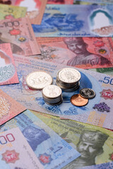 Brunei paper money, dollar banknotes and sen coins as currency for exchange or travel. Brunei money © chernikovatv