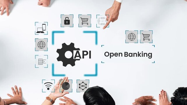 Diverse group discussing open banking concepts with API graphics on a white table, emphasizing technology and collaboration in financial innovation Gluon.