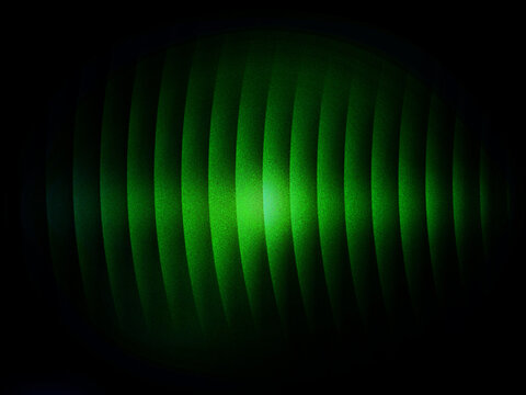 Green laser light diffraction pattern with vertical stripes on a black background.