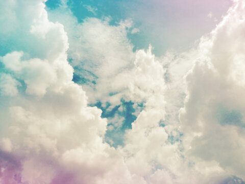 dramatic creamy white clouds with colorful effect added