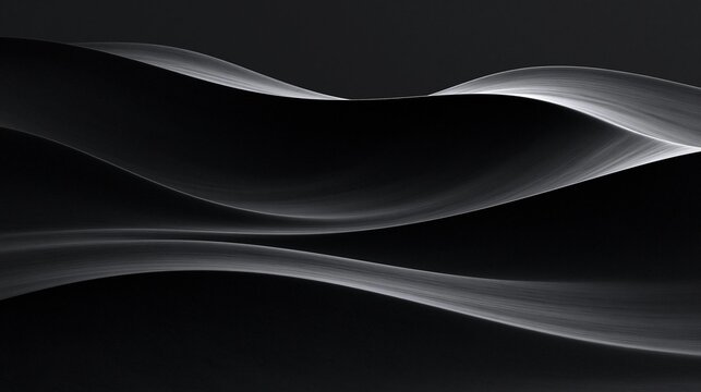 Black and white abstract background with a wave-like pattern. the wave appears to be made up of thin, wavy lines that create a sense of movement and depth.