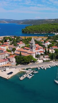 Osor City Panorama On Cres Island, Croatia,  Beautiful Summer Day. Aerial Views Show The Historic Old Town, Sunny Beaches, Sailing Yachts, Marina Harbor, Nearby Campsites Mediterranean Adriatic Coast