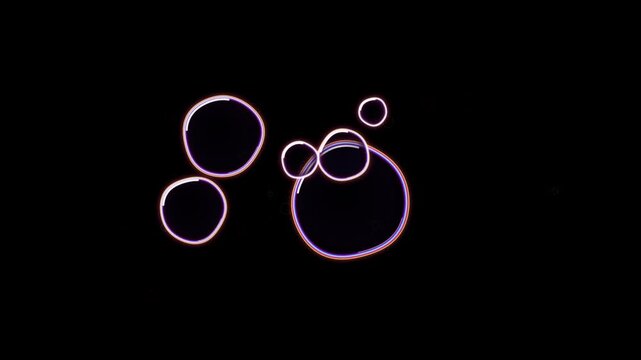 Abstract neon glowing circles floating motion background, with soft pulsing, light effects