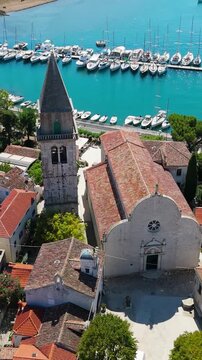Osor City Panorama On Cres Island, Croatia,  Beautiful Summer Day. Aerial Views Show The Historic Old Town, Sunny Beaches, Sailing Yachts, Marina Harbor, Nearby Campsites Mediterranean Adriatic Coast